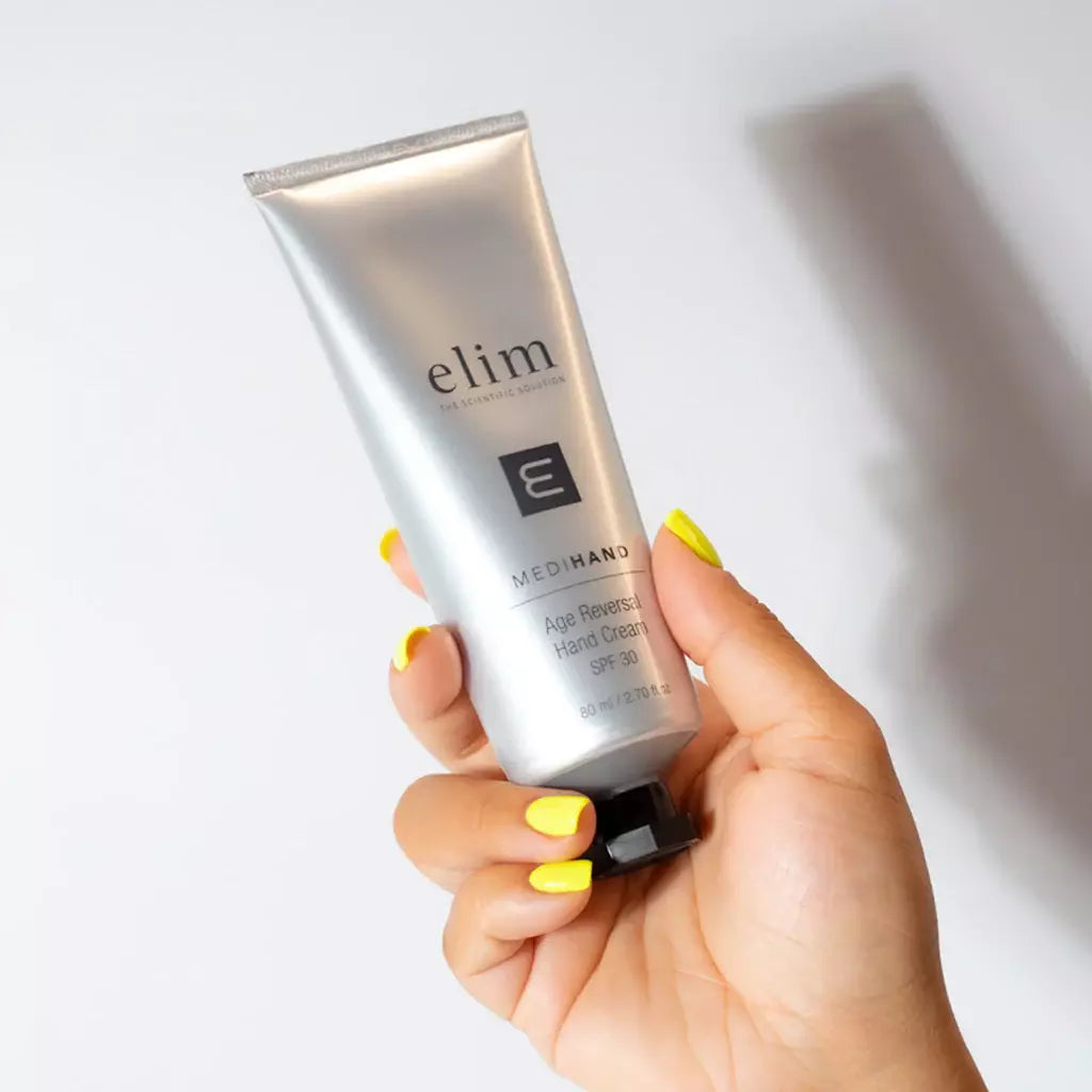 Hand applying Elim MediHand Age Reversal Hand Cream SPF 30 – hydrating, anti-ageing formula for smooth, sun-protected hands
