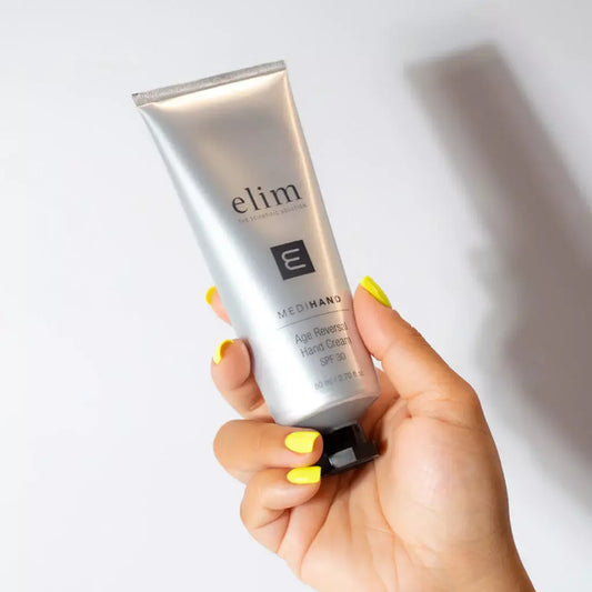 Hand applying Elim MediHand Age Reversal Hand Cream SPF 30 – hydrating, anti-ageing formula for smooth, sun-protected hands
