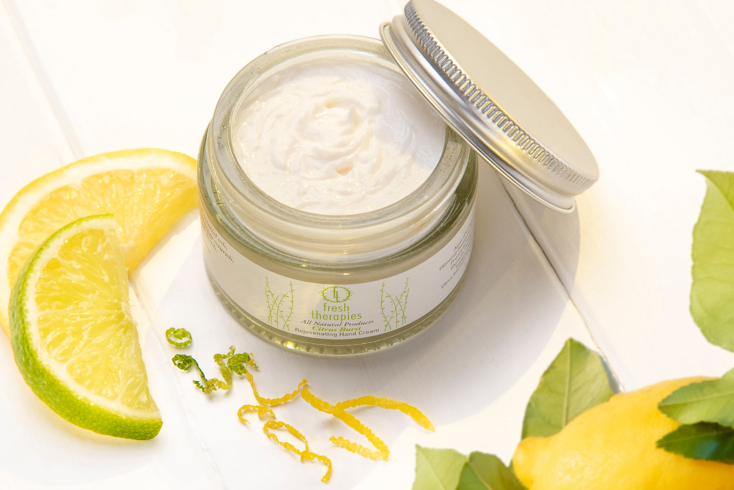 Applying Fresh Therapies Citrus Burst Hand Cream – eco-friendly, hydrating hand care for smooth, revitalised skin